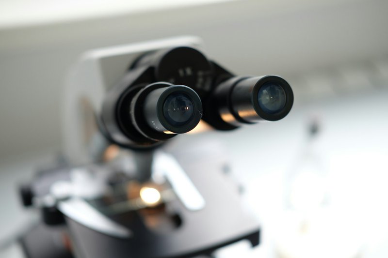 A close up of a camera on a tripod