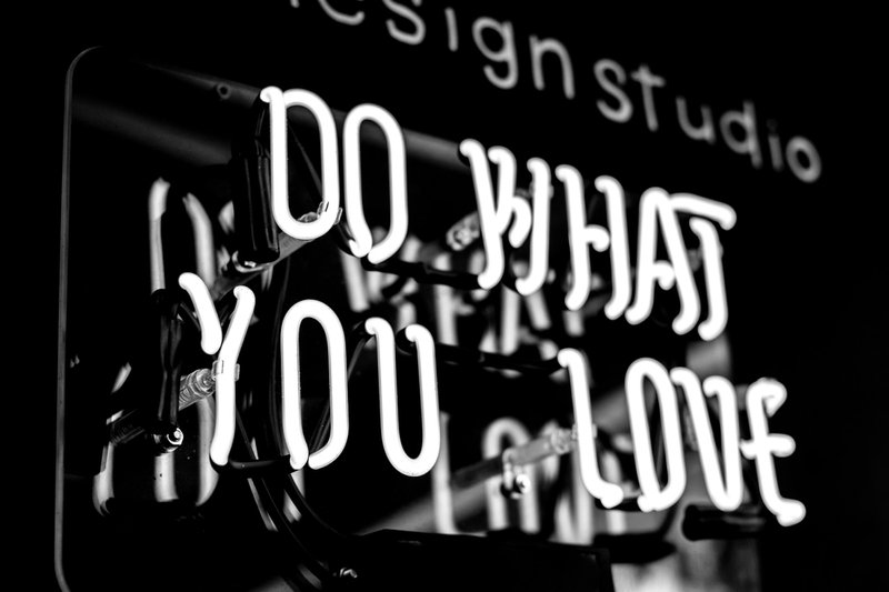 greyscale photo of DO What YOu Love signage