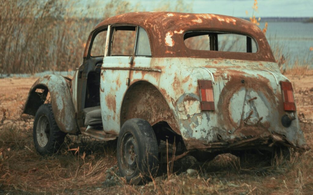 vintage car on brown field during daytime