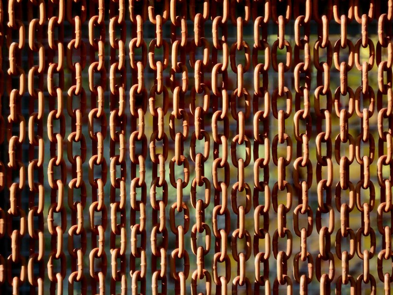 a close up view of a chain fence