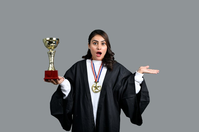 a person holding a trophy