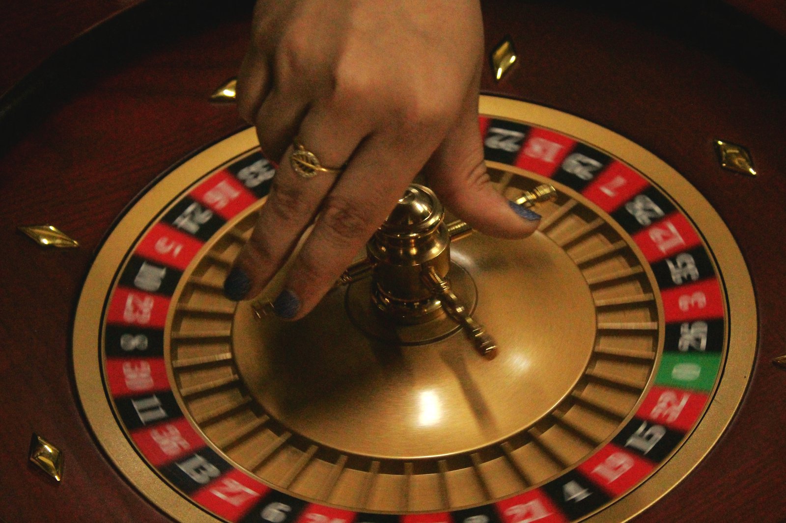 a hand holding a metal object