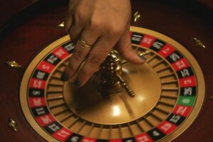 a hand holding a metal object