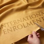 Coalition Tear Up International Ed Commitment