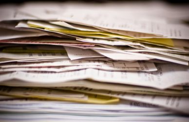 A close-up of a stack of papers.