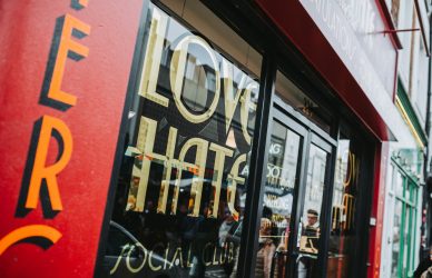 a store front with a sign