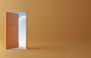 an open door leading to a bright orange room