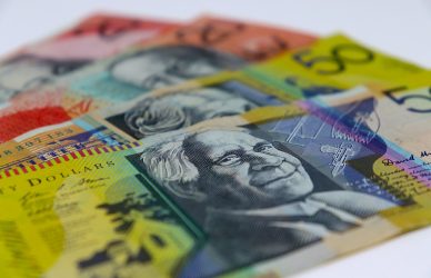 four assorted-denomination banknotes