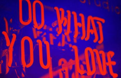 greyscale photo of DO What YOu Love signage