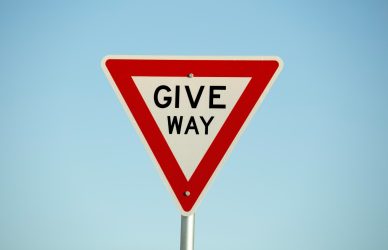 red and white no smoking sign