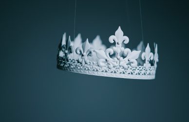 shallow focus photography white crown hanging decor