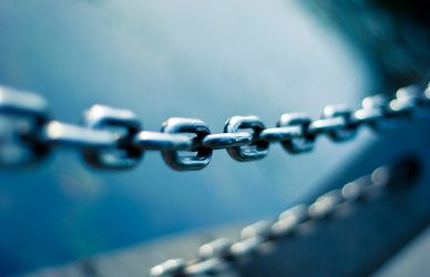 tilt shift lens photo of stainless steel chain