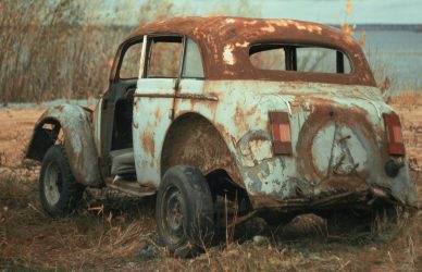 vintage car on brown field during daytime
